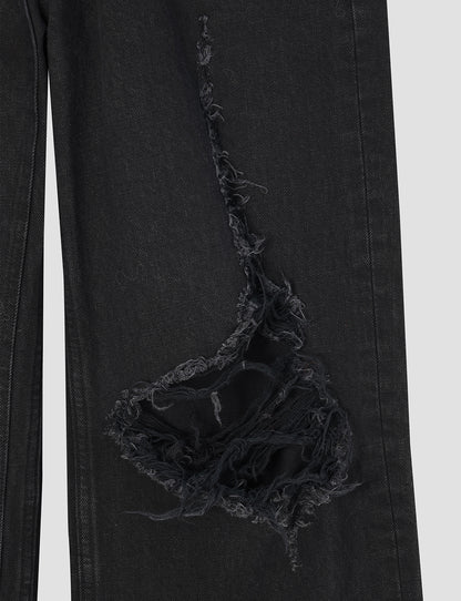 DISTRESSED JEANS