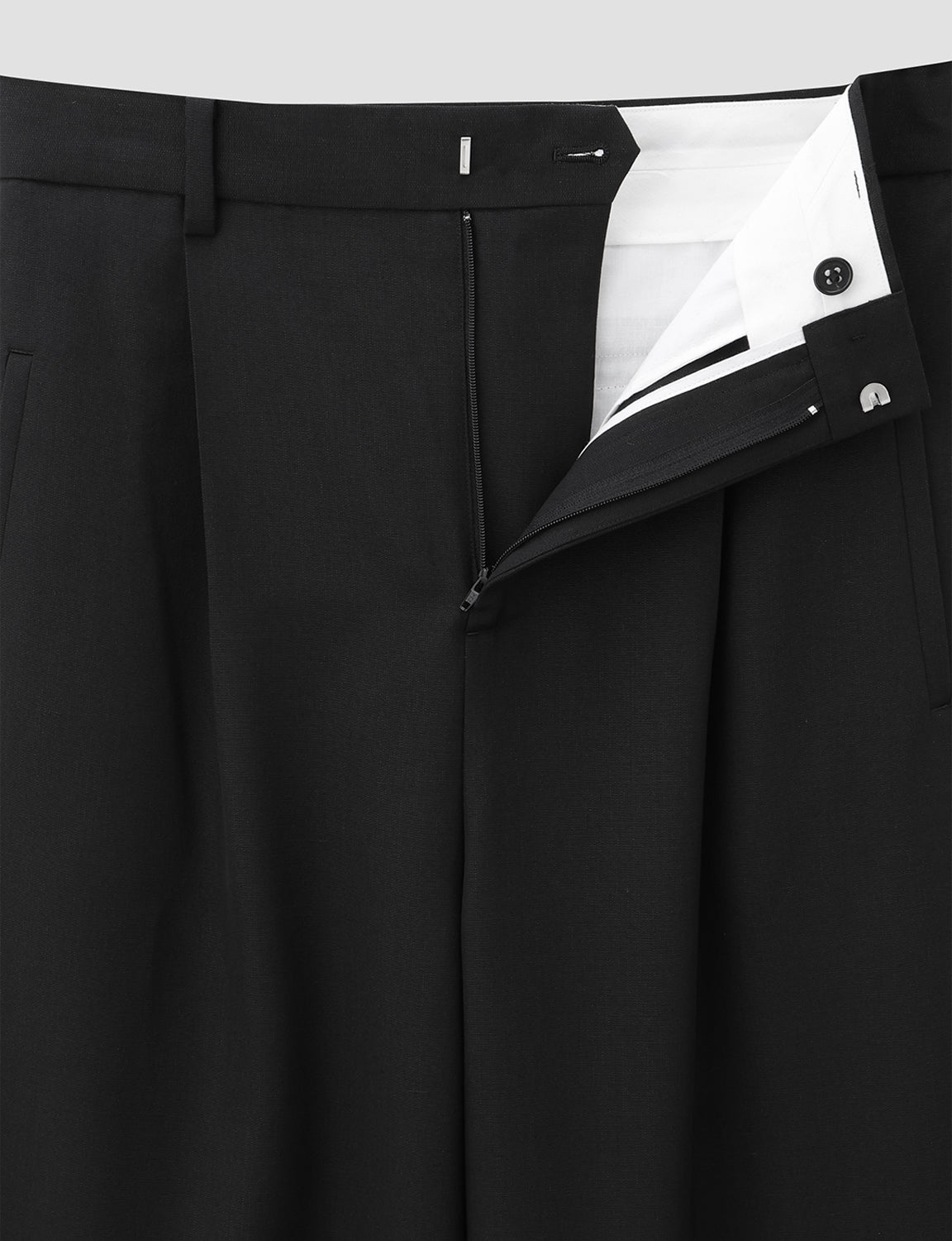 DISTRESSED WOOL TROUSERS